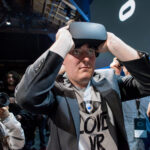 Palmer Luckey, founder of Oculus VR, demonstrates the new Oculus Rift headset during the "Step Into The Rift" event in San Francisco in June 2015. David Paul Morris/Bloomberg via Getty Images