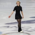U.S. figure skater Alysa Liu smiles while taking part in a training session Thursday in Milan ahead of the start of the Winter Olympic Games. (Robert Gauthier / Los Angeles Times)