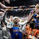 Oklahoma City Thunder guard Shai Gilgeous-Alexander celebrates with fans after Game 4 in a first-round NBA playoffs basketball series against the Phoenix Suns, Monday, April 27, 2026, in Phoenix. (AP Photo/Ross D. Franklin)